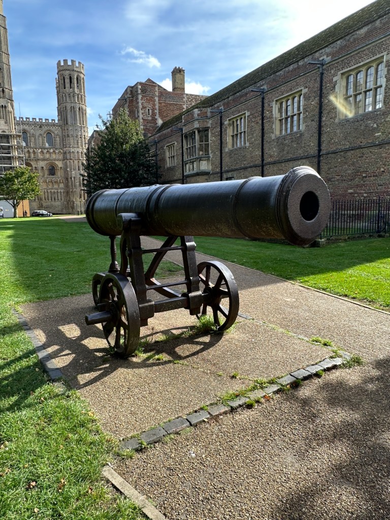Ely cannon seen from the right looking towards the cathedral and the old Bishop's Palace