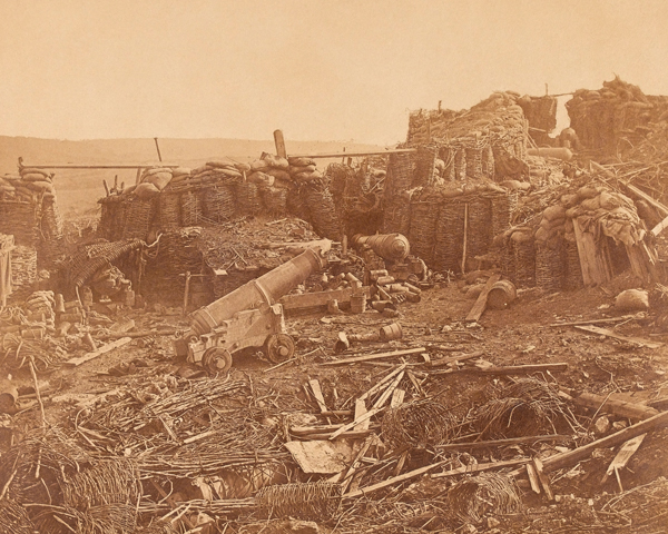 Remains of Russian cannon and gabions, wreckage lying around the deserted bastion.